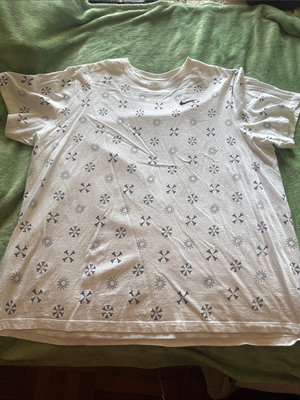 Nike white Tee with Black Multi-Swoosh Design